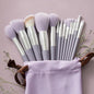 A set of thirteen makeup brushes